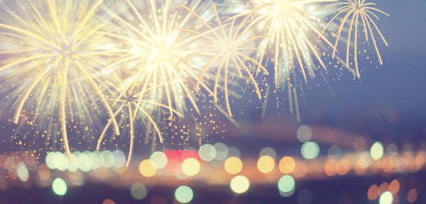 istock abstract show group of exploding fireworks bright light and vibrant colorful city night sky outside buildings view from rooftop background for celebration about merry christmas,happy new year 2019 ,diwali,labor's day ,independence's day concept 1086225328