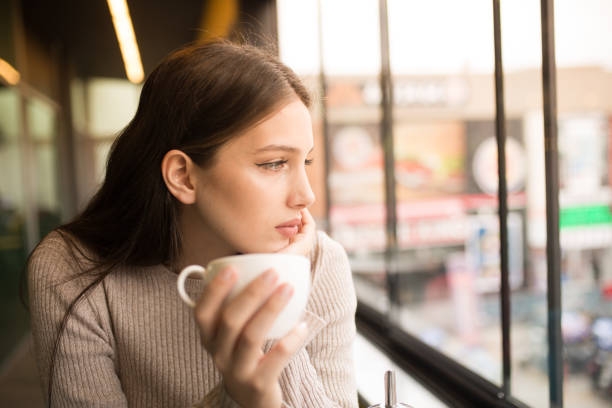 istock women who is enjoy in cafe 1086227554