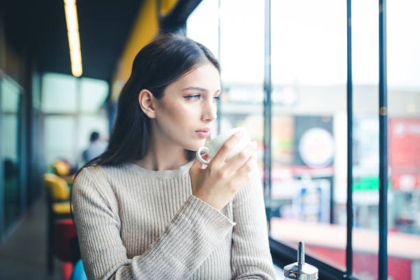 istock women who is enjoy in cafe 1086227558