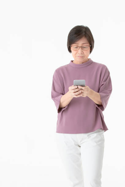istock Senior woman using smart phone. 1086232172