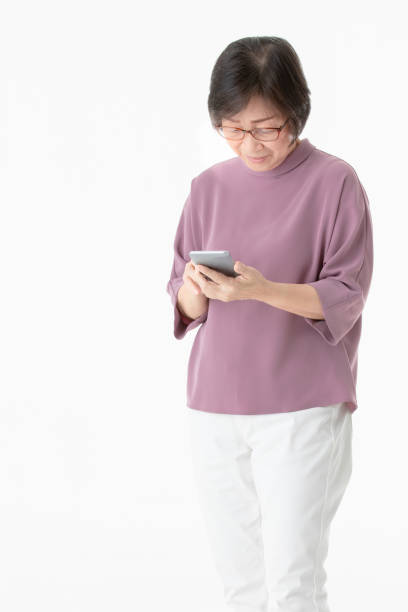 istock Senior woman using smart phone. 1086232180
