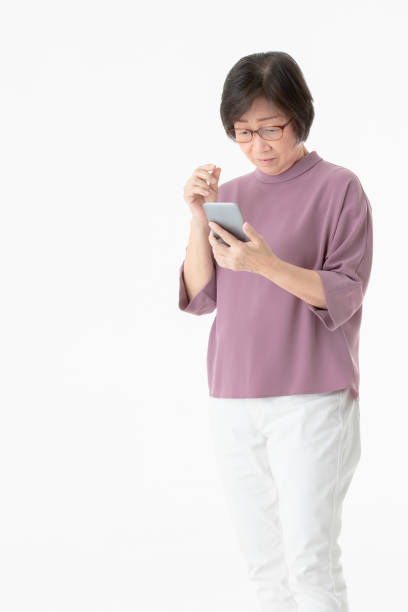istock Senior woman using smart phone. 1086232190