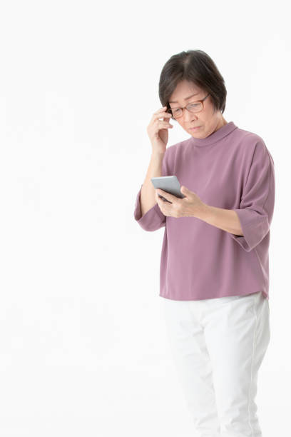 istock Senior woman using smart phone. 1086232192