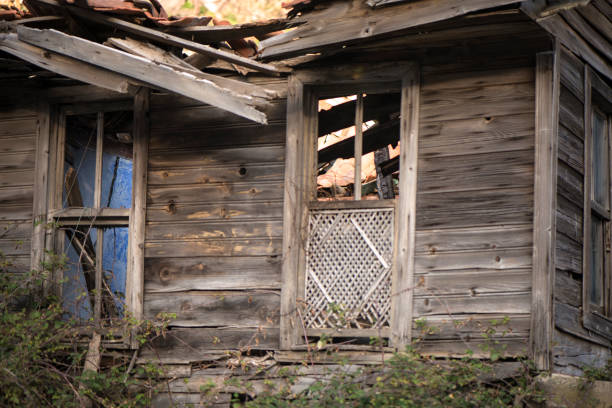 Ruined and abandoned old wooden house