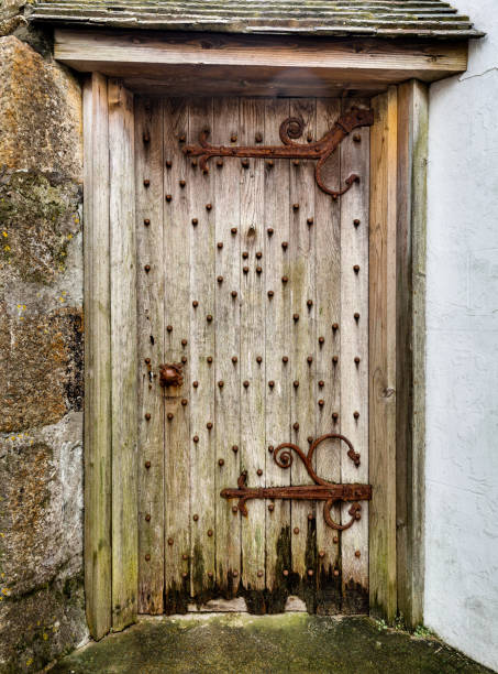 istock Old Wooden Door with Rusty Hinges and  Handle. 1086236770