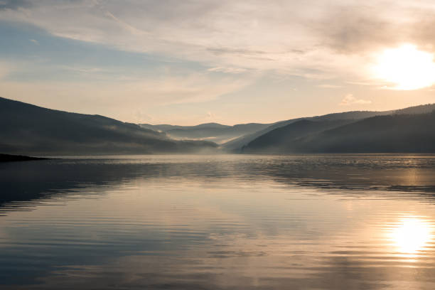 istock Tranquil mountain lake colorful sunset 1086240972