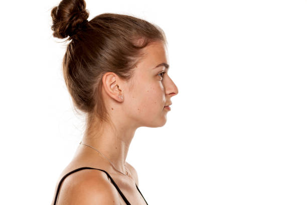 Woman Face Side View Bun Hair Fashion Model Beauty Makeup Stock Photos,  Pictures & Royalty-Free Images - iStock