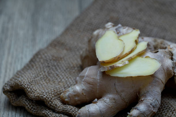 istock Close up of sliced fresh ginger root spice 1086243956