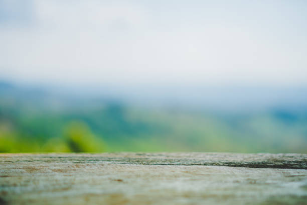 istock Selective focus of empty old wood on blur nature green leaf with bokeh abstract background. 1086249534