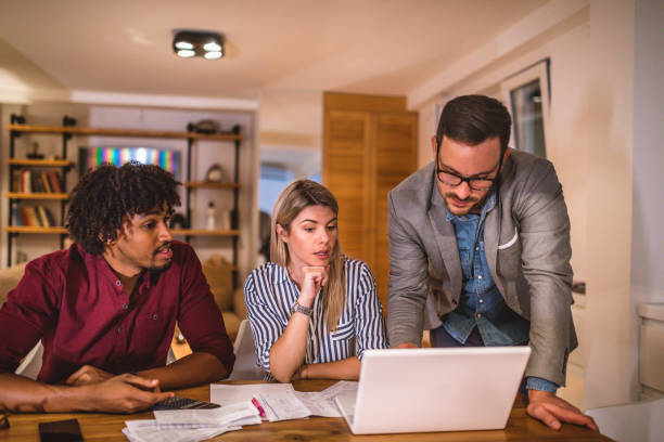istock Financial advisor working with young couple 1086254482