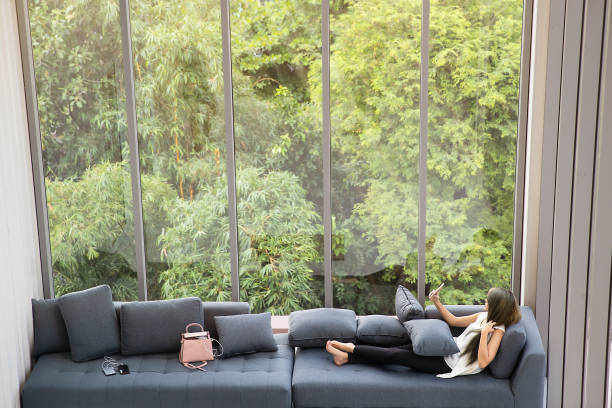 istock Woman laying on sofa  at home. 1086255192