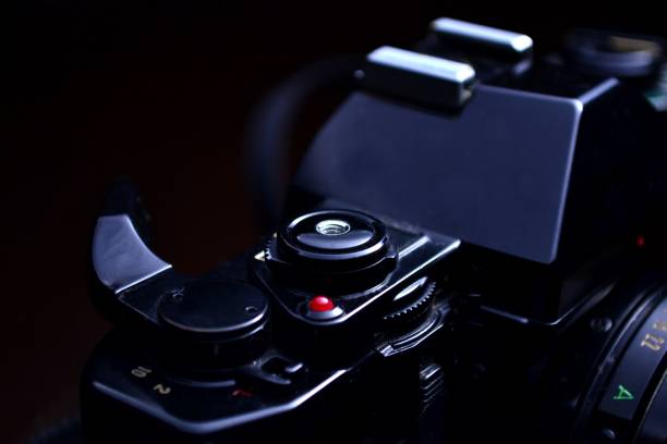 istock Shutterspeed dial, shutter button and film advance crank of a film camera 1086257236