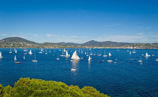Les Voiles de Saint-Tropez regatta yachts an the bay are waiting for the race start. Provence Cote d'Azur, France.
