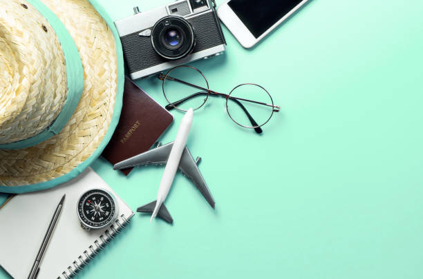 istock Travel accessories objects and gadgets top view flatlay on blue pastel 1086262812