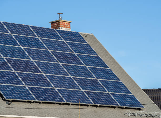 istock Home with solar panels on the roof 1086262878