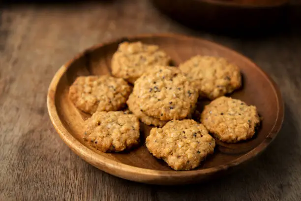 Vegan oatmeal chiaseeds cookies on plate with natural light.