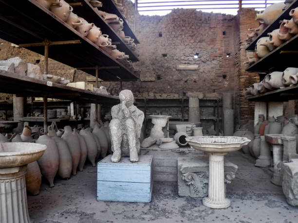 Excavations and victim of ancient city Pompeii, Italy Excavations and man victim of ancient city Pompeii, Italy victims the ruins of pompeii stock pictures, royalty-free photos & images