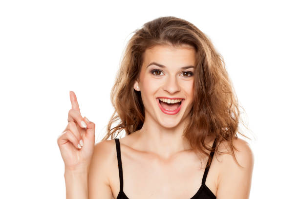 istock Beautiful happy woman has an idea 1086265794