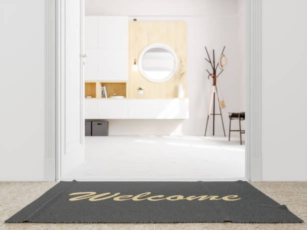 istock Doormat with Welcome Text in Front of Door 1086267410