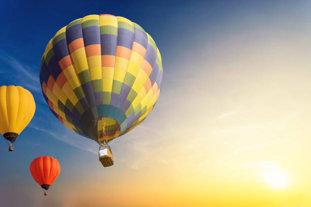 istock Colorful balloons floating in the sky at sunset. 1086270142