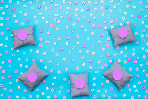 istock Decorative background with colored buttons in bulk and gift box. 1086272070