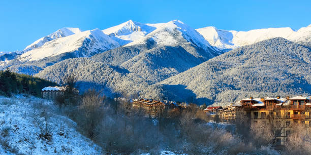 istock snow mountains panorama in ski resort Bansko 1086277402