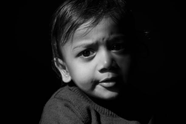 istock monochrome portrait cute child looking at camera 1086290662