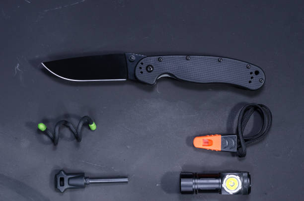 istock Knife, small flashlight and flint. Tourist set. Urban Set. 1086291638