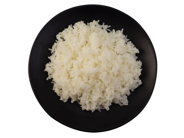 istock Rice in a bowl on white background. (clipping path) 1086300246