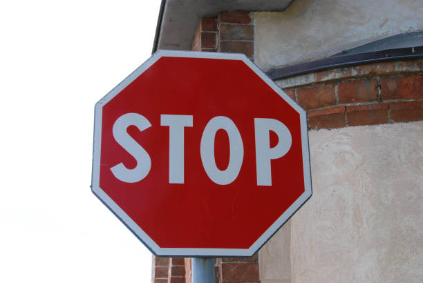 istock Road sign with stop sign 1086300964