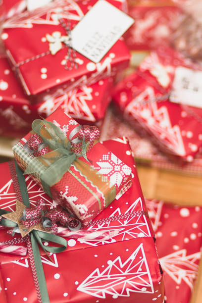 istock Big and small red, gold and silver christmas gift boxes 1086304182