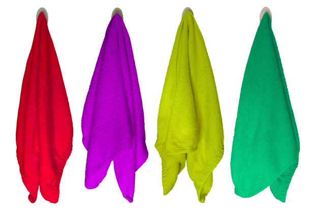 A row of towels with different colors and patterns. The towels are arranged in a row, with the lightest color on the left and the darkest on the right. The towels are all different sizes and shapes