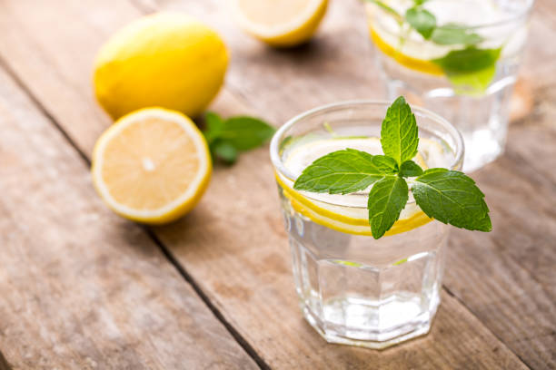 istock Lemon drink with mint and ice in glasses 1086311282
