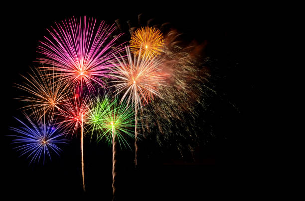 istock Colorful fireworks celebration and the night sky background. 1086311502