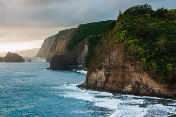 Steep island covered in lush foliage in Pacific Ocean, Maui
