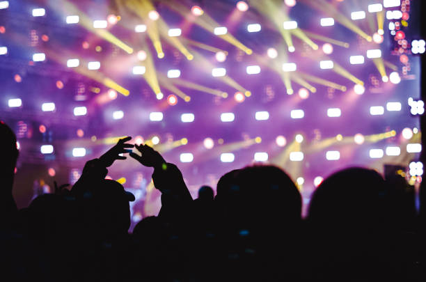 istock hands of people at the concert 1086318714