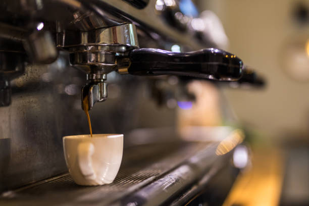 istock Coffee extraction from professional coffee machine. Coffee shop. 1086329750