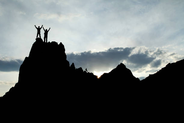 istock successful and determined people at the summit 1086330460