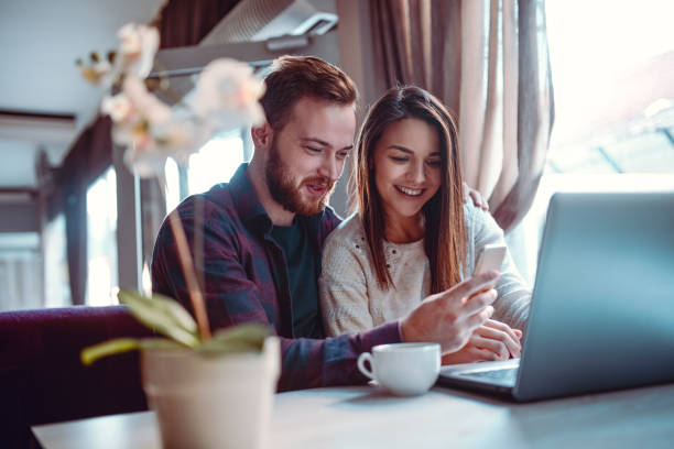 istock Cute Couple In On-line Quest For Next Travel Destination 1086332248