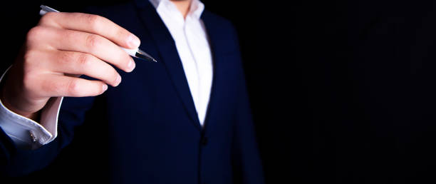 istock businessman writes a pen on the screen 1086334406