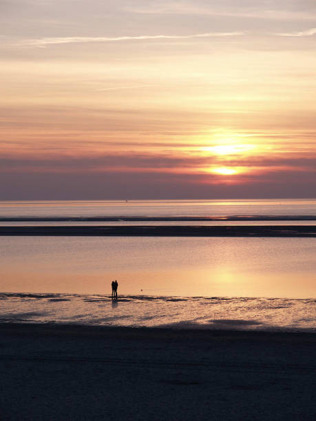 istock sundown at the north sea 1086337148