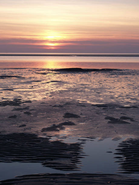 istock sundown at the north sea 1086337306