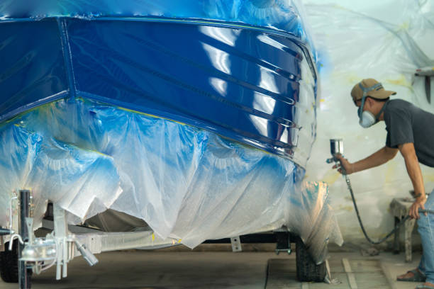 istock spray gun with paint for painting a boat 1086341354
