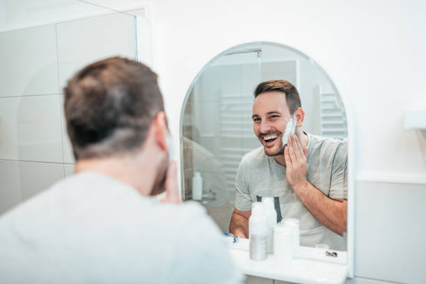 istock Happy young man shaving. 1086347156