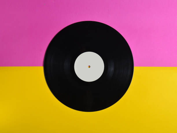 istock Vinyl plate on a colored pastel background, retro music technology, top view, minimalism 1086347272