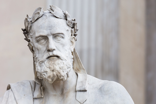 Portrait of the stone statue of greek philosopher Xenophon in front of the austrian parliament in Vienna