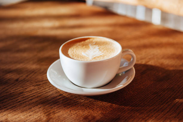 istock coffee cup latte art in cafe 1086358804