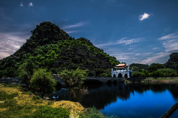 istock lake in mountains tam coc vietnam 1086359408
