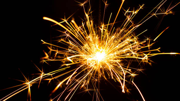 istock Christmas sparkler isolated on black background. Bengal fire 1086360920