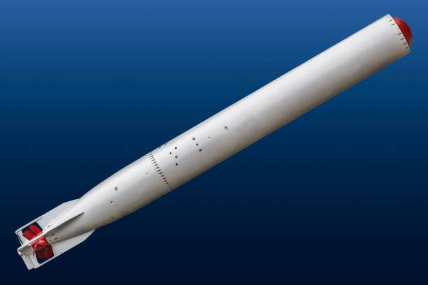 istock Old Defused Submarine Torpedo TG 53 Isolated on Blue Background 1086361292